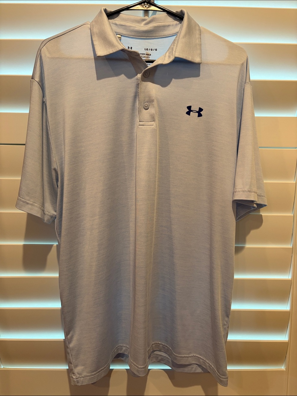 Under Armour Men’s Pale Blue Polo with Black Logo